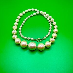 Faux pearl necklace.